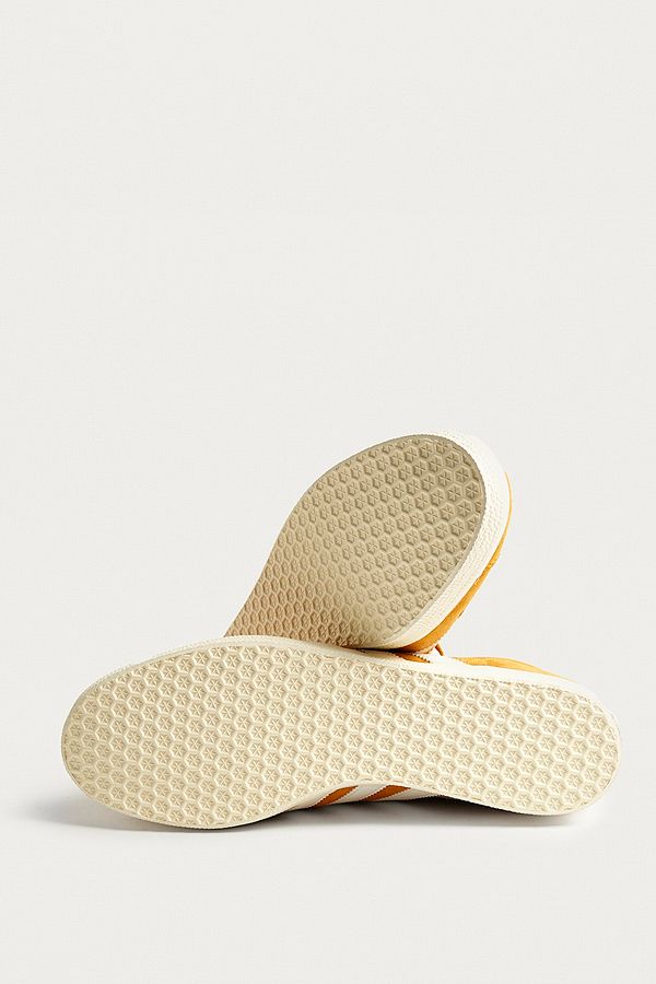 adidas Gazelle Gold Suede Trainers | Urban Outfitters Slide View: 5: adidas Gazelle Gold Suede Trainers