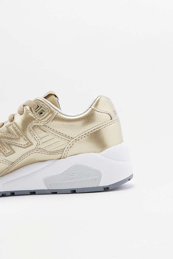 new balance 580 trainers in gold new balance 580 trainers in gold